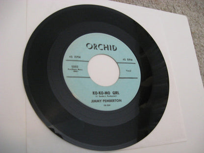Ko-Ko-Mo Girl / Mathematics Of Love (7") | Very Good (VG) Generic