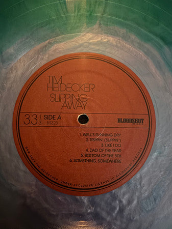 Slipping Away (TRANSLUCENT BLUE WAVE VINYL) | Mint (M) Mint (M)