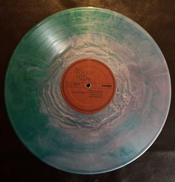 Slipping Away (TRANSLUCENT BLUE WAVE VINYL) | Mint (M) Mint (M)